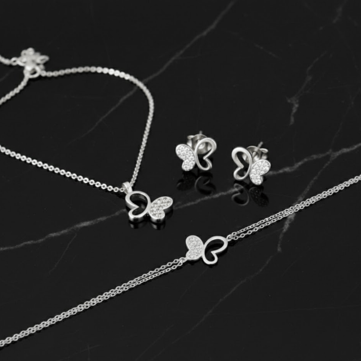 925 Ayar Gümüş Kelebek Figürlü Üçlü Takı Seti – Kolye Bileklik Küpe Şık Tasarım